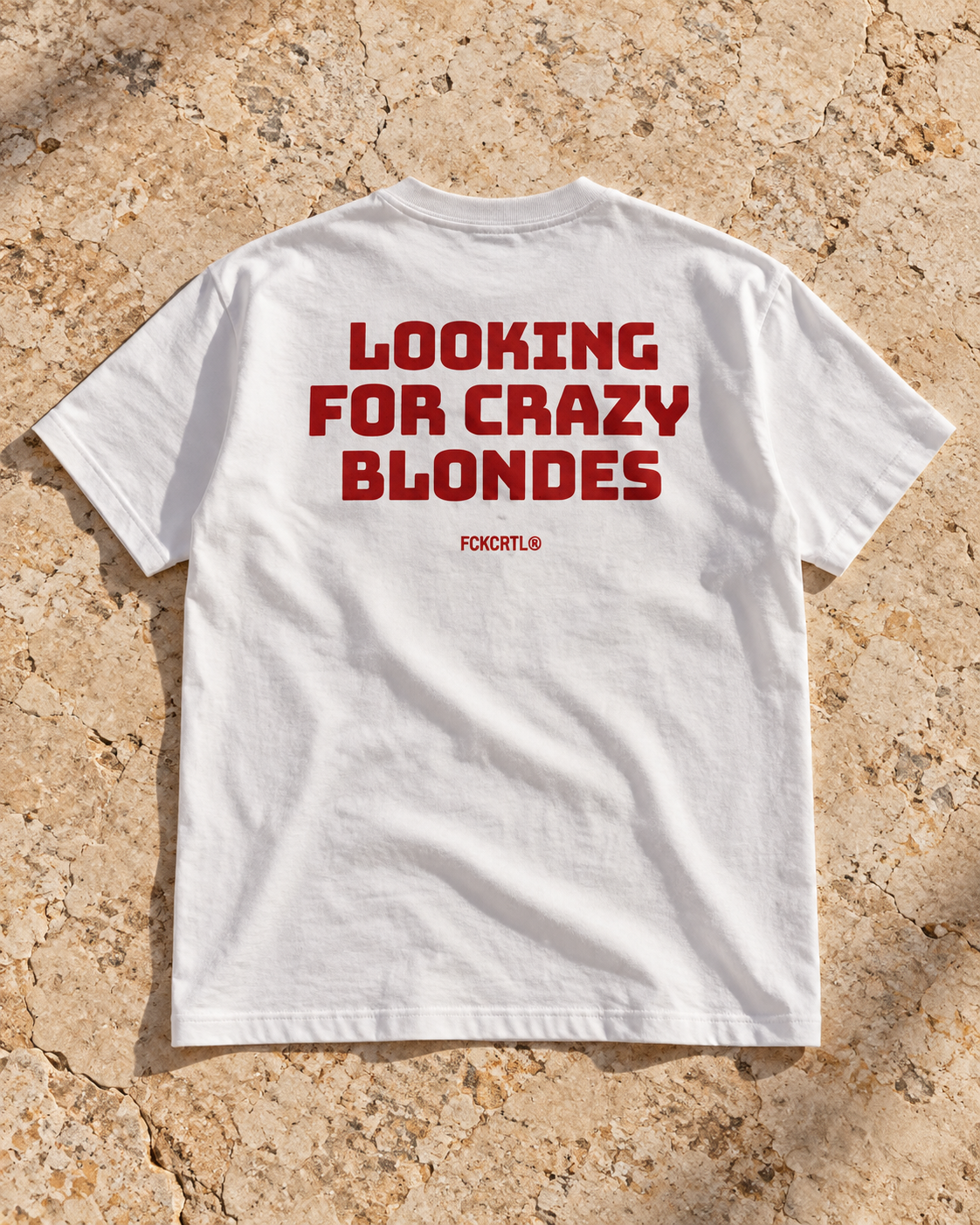 Looking for Crazy Blondes white T-shirt with red back print, editorial flat lay
